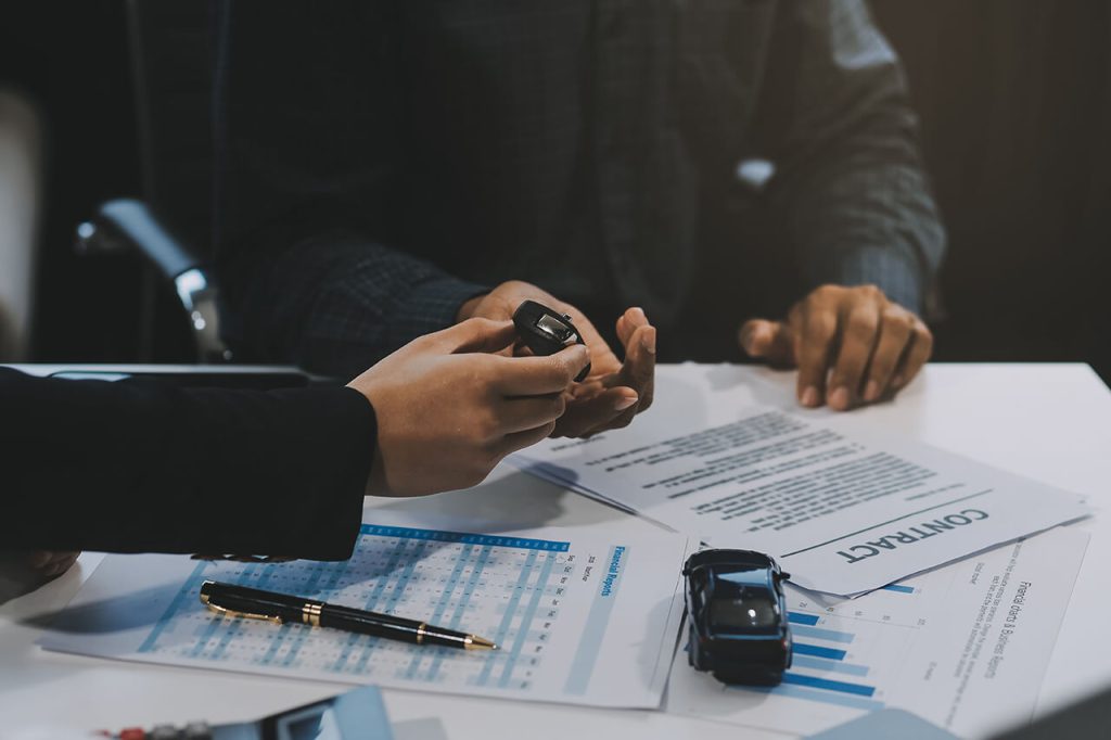 car-sales-representative-gives-keys-new-car-owner-concept-car-rental-focus-key-pick-up-key-closeup-key-transfer-from-new-machine-buyer