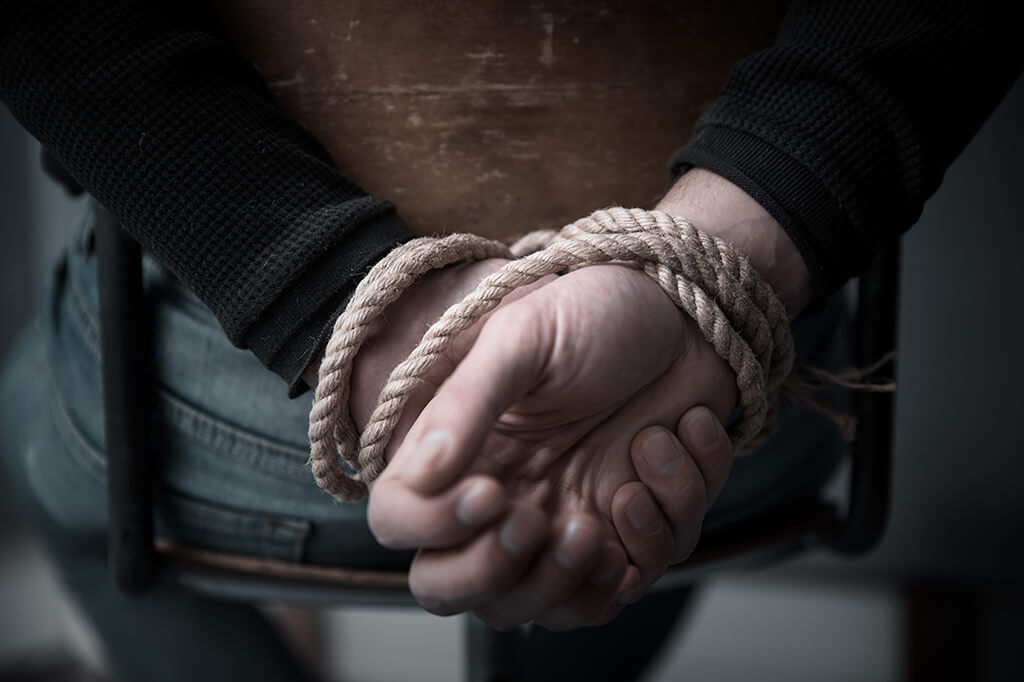 hands-tied-up-with-rope